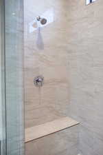 Bathroom with tiled shower