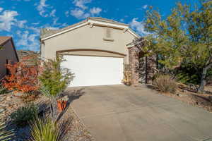 View of front of home featuring a garage