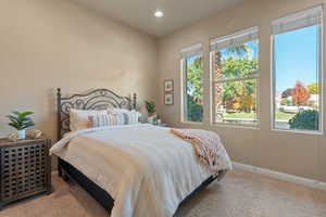 Bedroom featuring carpet flooring