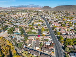 Birds eye view of property with a mountain view