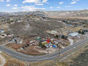 Birds eye view of property featuring a mountain view