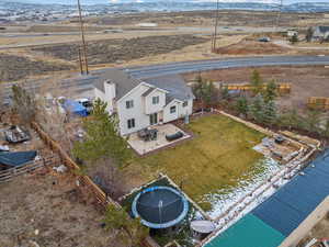 Birds eye view of property featuring a rural view