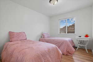 Bedroom with light wood-type flooring