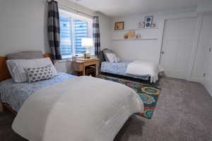 View of carpeted bedroom