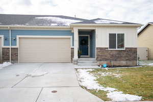 View of front of property with a garage