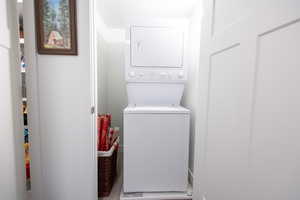 Laundry area with stacked washer / dryer