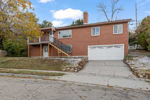 View of front of home featuring a garage