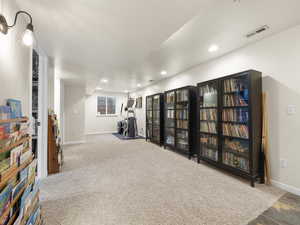 Sitting room featuring carpet