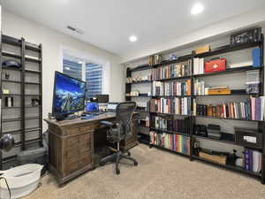 View of carpeted home office