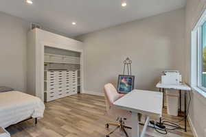 Office space with light wood-type flooring