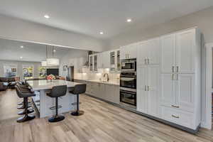 Kitchen great room with high end appliances and huge island.