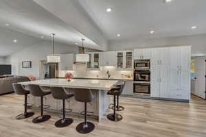 Kitchen great room with high end appliances and huge island.