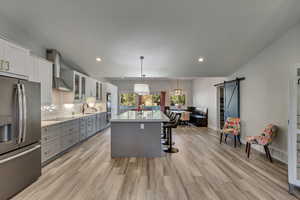 Kitchen with high end appliances and huge island.