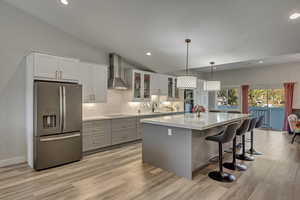 Kitchen with high end appliances and huge island.