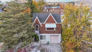 View of front of property featuring a garage