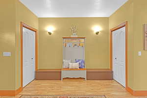 Hallway with light wood-type flooring