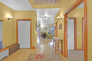 Entrance foyer featuring light wood-type flooring