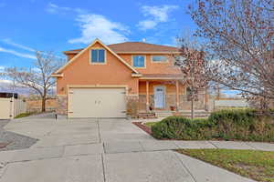 Front of property with a garage