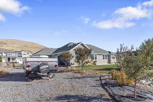 Ranch-style home featuring a mountain view