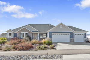 View of front facade featuring a garage