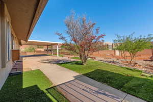 View of yard with a patio