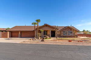 Single story home with a garage