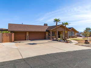 Single story home with a garage