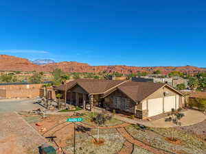 View of front of property with a mountain view