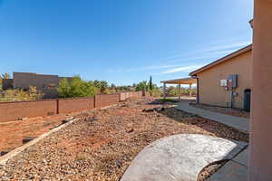 View of yard featuring central air condition unit and a patio