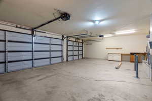 Garage featuring a garage door opener