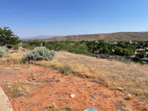 Property view of mountains with a rural view