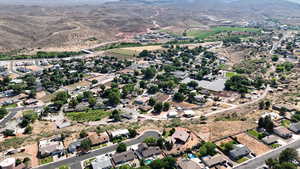 Birds eye view of property with a mountain view