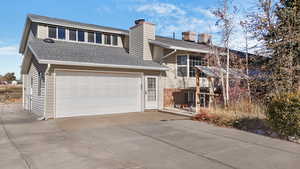 Exterior space featuring a garage