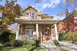 View of front of house featuring covered porch