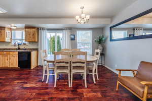 Dining space featuring acacia wood floor. Plenty of space for any dinning table.