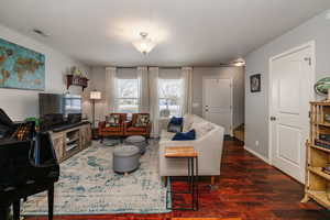 Living room with acacia wood floor.