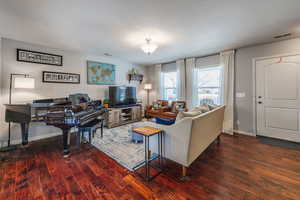 Living room with acacia wood floor.