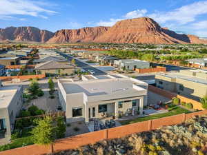 Birds eye view of property with a mountain view