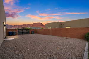 Yard at dusk with a mountain view