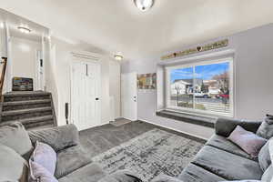 Living room with carpet floors