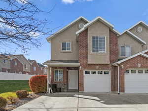 View of front of home featuring a garage