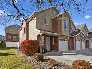 View of front of home featuring a garage