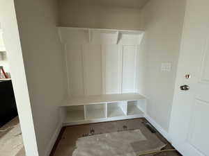 Mudroom featuring baseboards