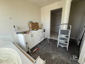 Bathroom featuring baseboards