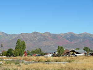 Property view of mountains featuring a rural view