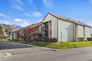 View of property with a mountain view