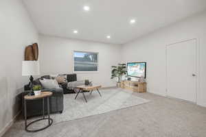 Living room featuring carpet flooring