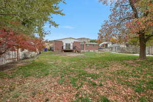 View of yard with a deck