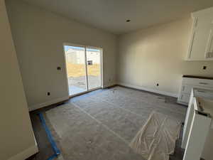 Interior space featuring baseboards