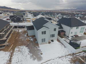 Snowy aerial view with a mountain view